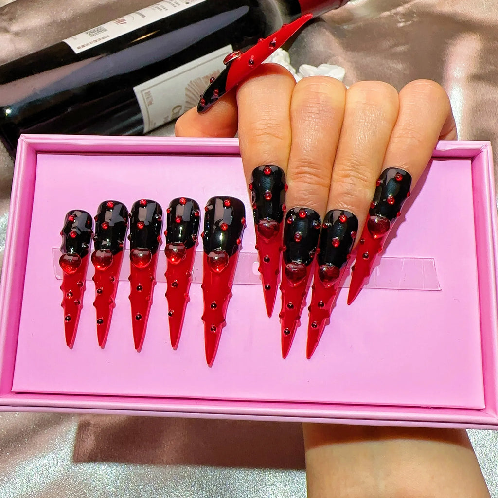 Ongles press-on en acrylique faits main, design de créateur avec strass, forme amande, longueur longue, livrés avec colle, emballage personnalisé.