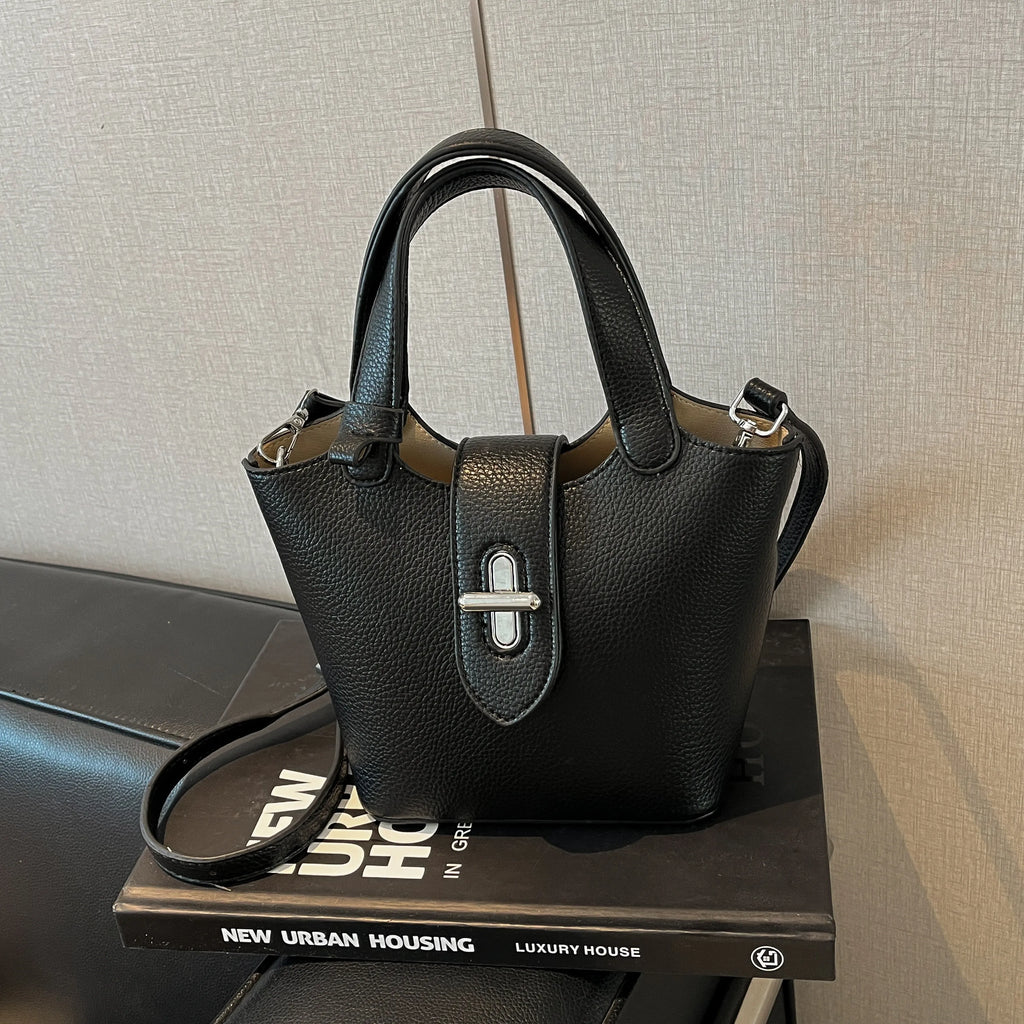 Sac à bandoulière pour femme en PU haut de gamme, nouvelle collection printemps 2026, élégant et facile à assortir. Sac seau raffiné pour les déplacements quotidiens, porté épaule ou croisé, avec fermeture à fermoir