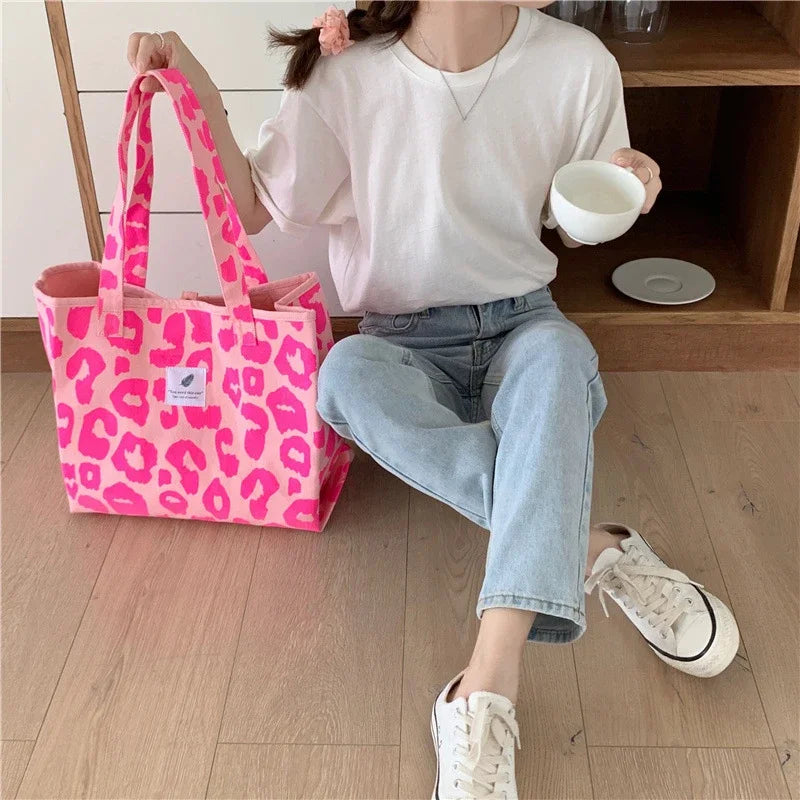 Sac à main imprimé léopard rose pour femme, grande capacité, sac à provisions portable, sac de livre étudiant, fourre-tout unique initié, nouvelle mode