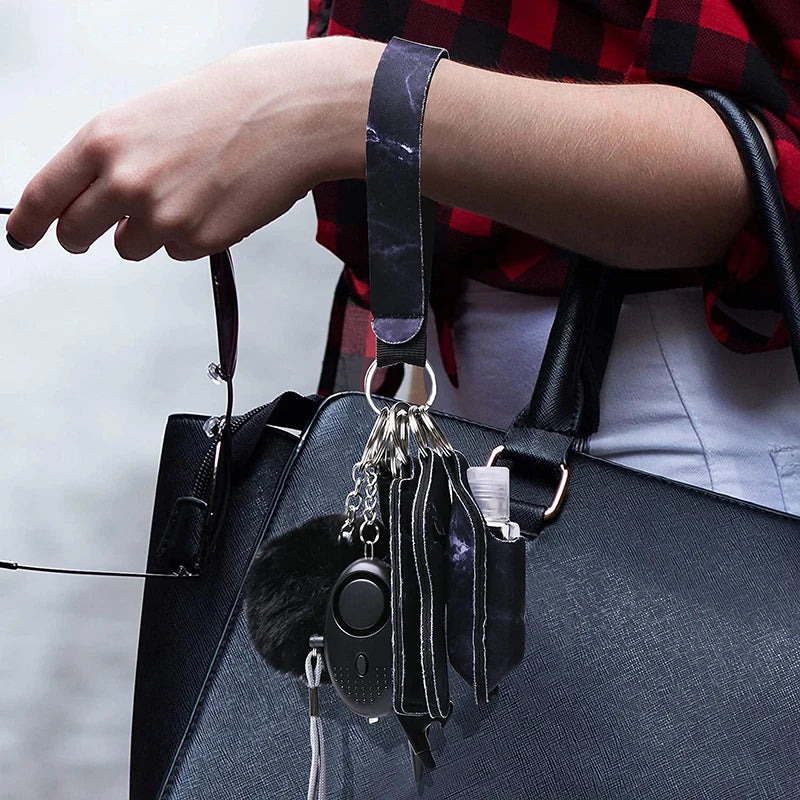 Accessoires de porte-clés de défense personnelle en extérieur – Produits de self-défense sous forme de porte-clés pour femmes. Accessoire portable conçu pour être facilement attaché à un sac ou des clés, destiné à un usage de protection personnelle.