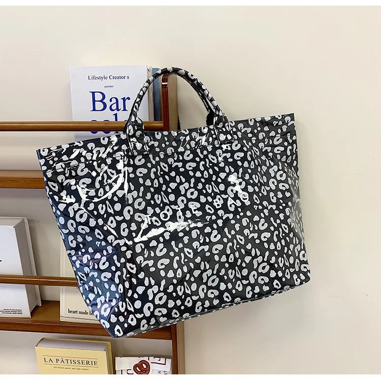 Sac fourre-tout imprimé léopard pour femmes, sacs à main américains de grande capacité en PVC, pochette de transport tendance, sacs à bandoulière décontractés pour dames, nouvelle collection 2025