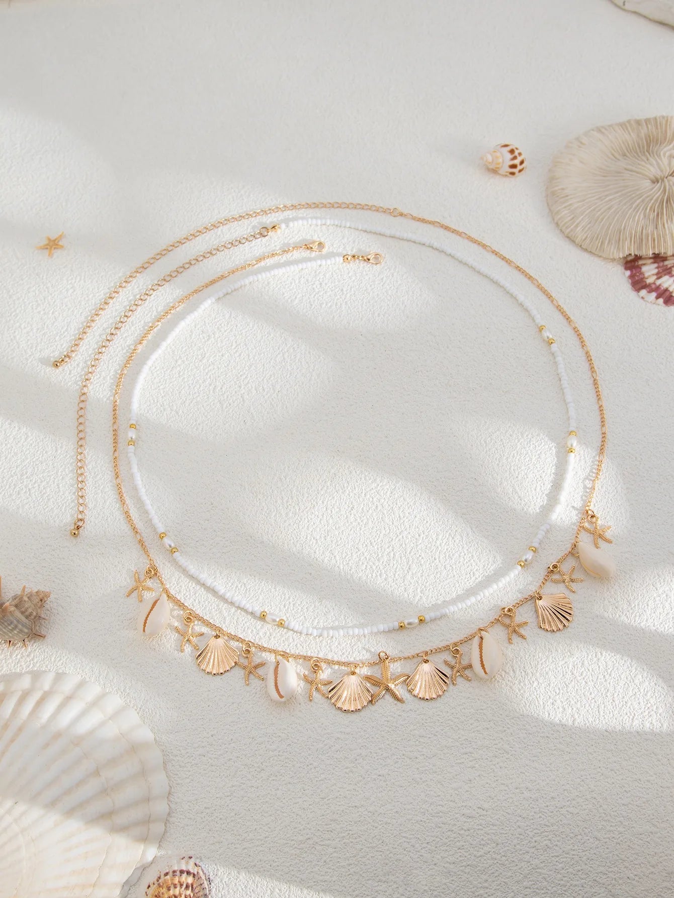 Nouvelle chaîne de taille en coquillage d'étoile de mer de plage bohème européenne et américaine, chaîne de corps en forme de conque de perle d'imitation de mode