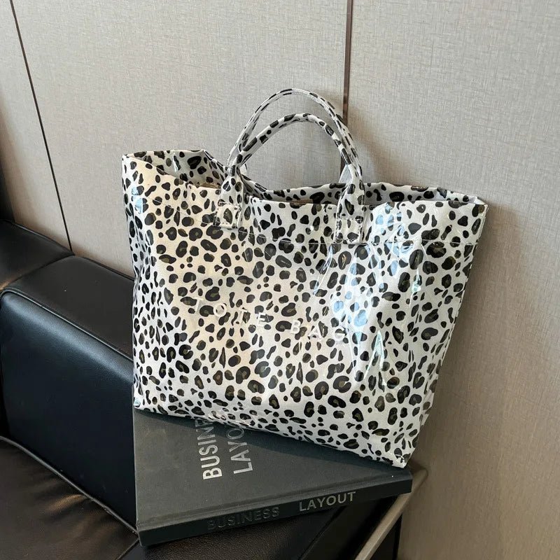 Sac fourre-tout imprimé léopard pour femmes, sacs à main américains de grande capacité en PVC, pochette de transport tendance, sacs à bandoulière décontractés pour dames, nouvelle collection 2025
