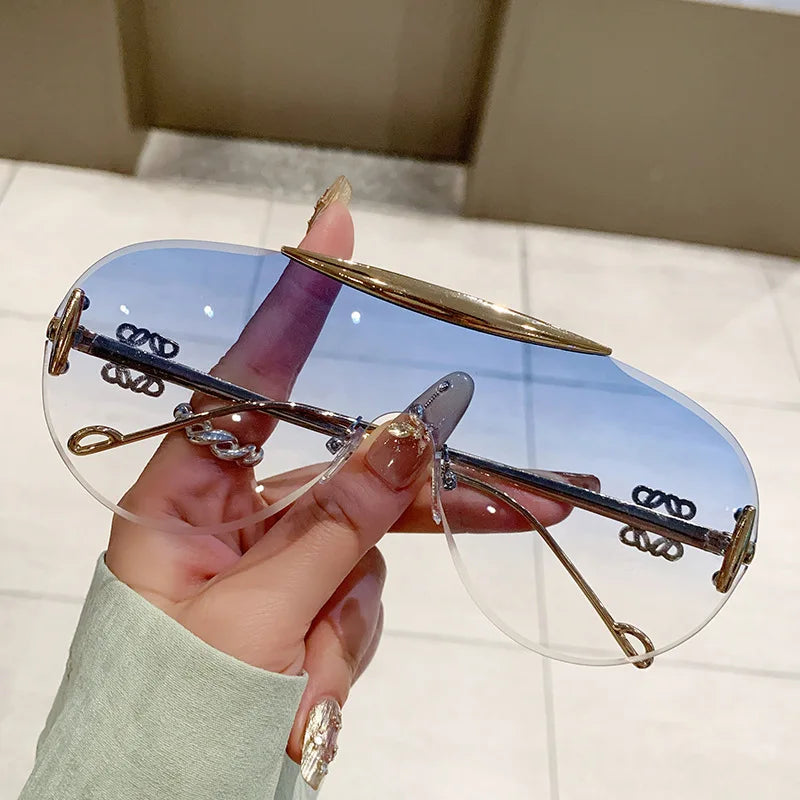 Coupe sans monture surdimensionné une pièce bouclier lunettes de soleil pour femmes mode alliage grand cadre dégradé Y2K lunettes de soleil dames nuances