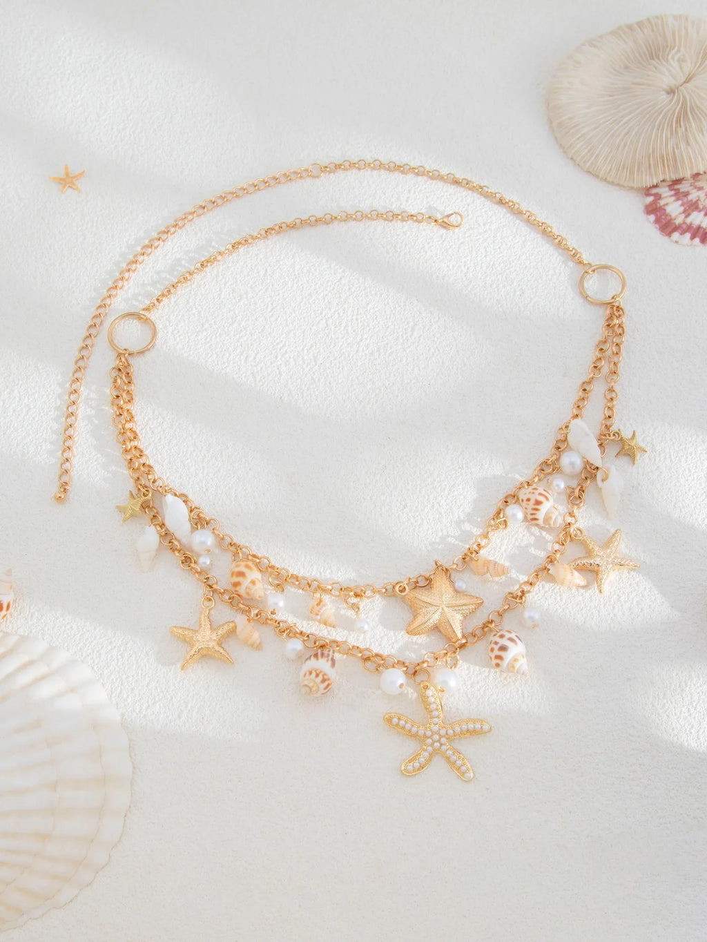 Nouvelle chaîne de taille en coquillage d'étoile de mer de plage bohème européenne et américaine, chaîne de corps en forme de conque de perle d'imitation de mode