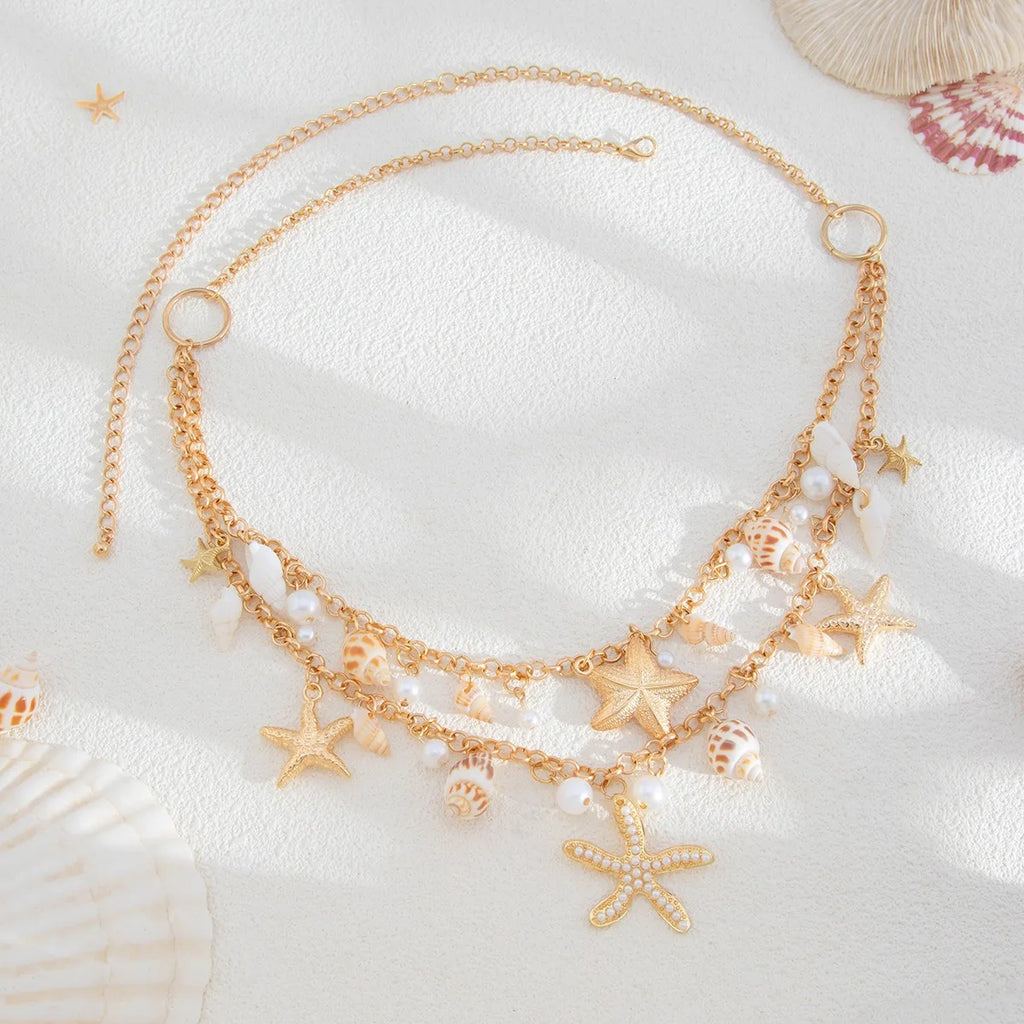 Nouvelle chaîne de taille en coquillage d'étoile de mer de plage bohème européenne et américaine, chaîne de corps en forme de conque de perle d'imitation de mode