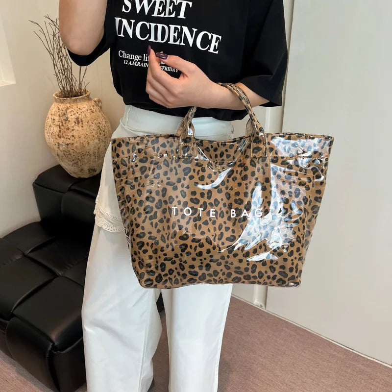 Sac fourre-tout imprimé léopard pour femmes, sacs à main américains de grande capacité en PVC, pochette de transport tendance, sacs à bandoulière décontractés pour dames, nouvelle collection 2025