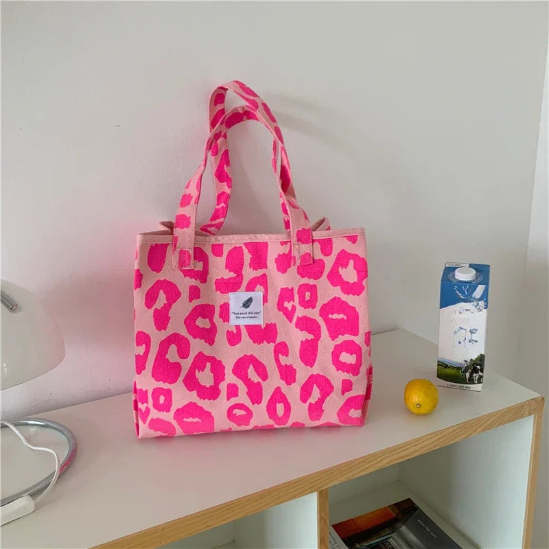Sac à main imprimé léopard rose pour femme, grande capacité, sac à provisions portable, sac de livre étudiant, fourre-tout unique initié, nouvelle mode